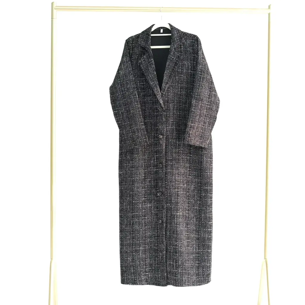 Long winter jacket made of tweed wool fabric